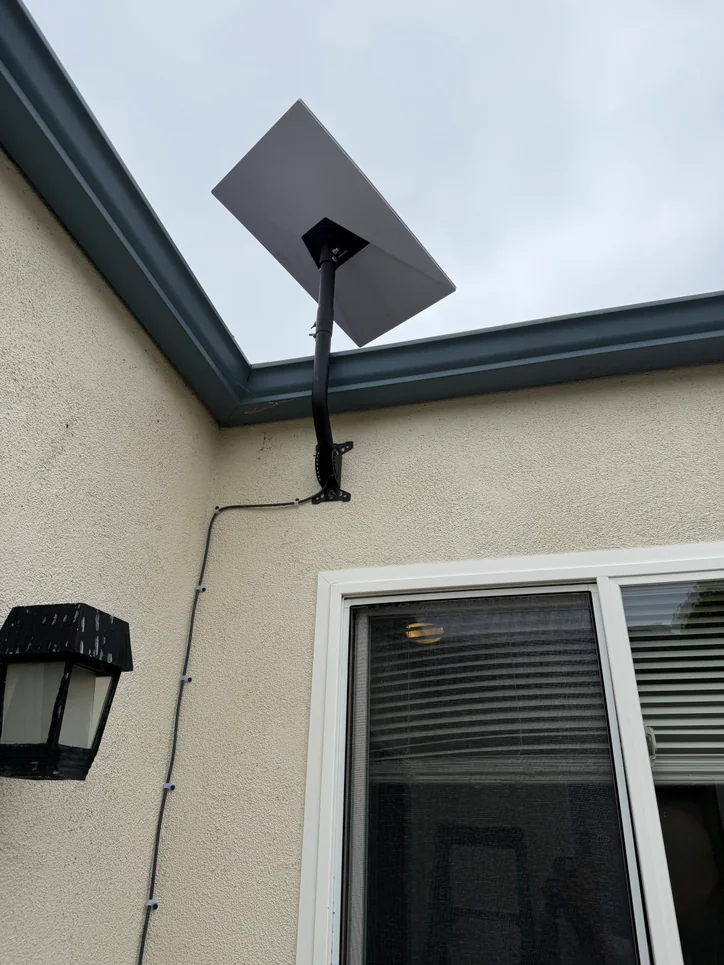 Finished wall-mounted Starlink terminal installation completed by Mitec